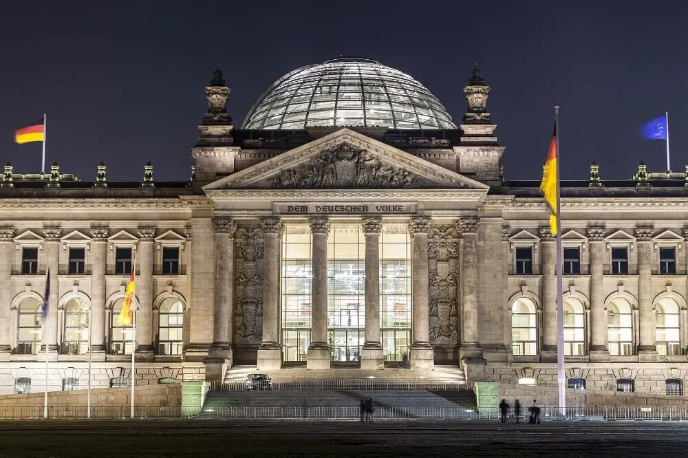 The Reichstag Building in Berlin, Germany at night.