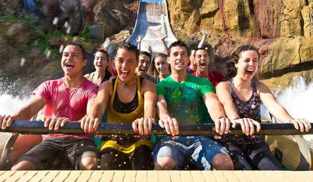 Tourists squeal as they take on the Atracciones Tutuki Splash Rollercoaster at a waterpark in Barcelona, Spain.