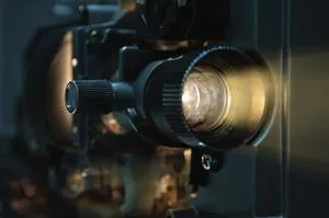 A shot of a camera, showing a movie at a film festival in Barcelona.