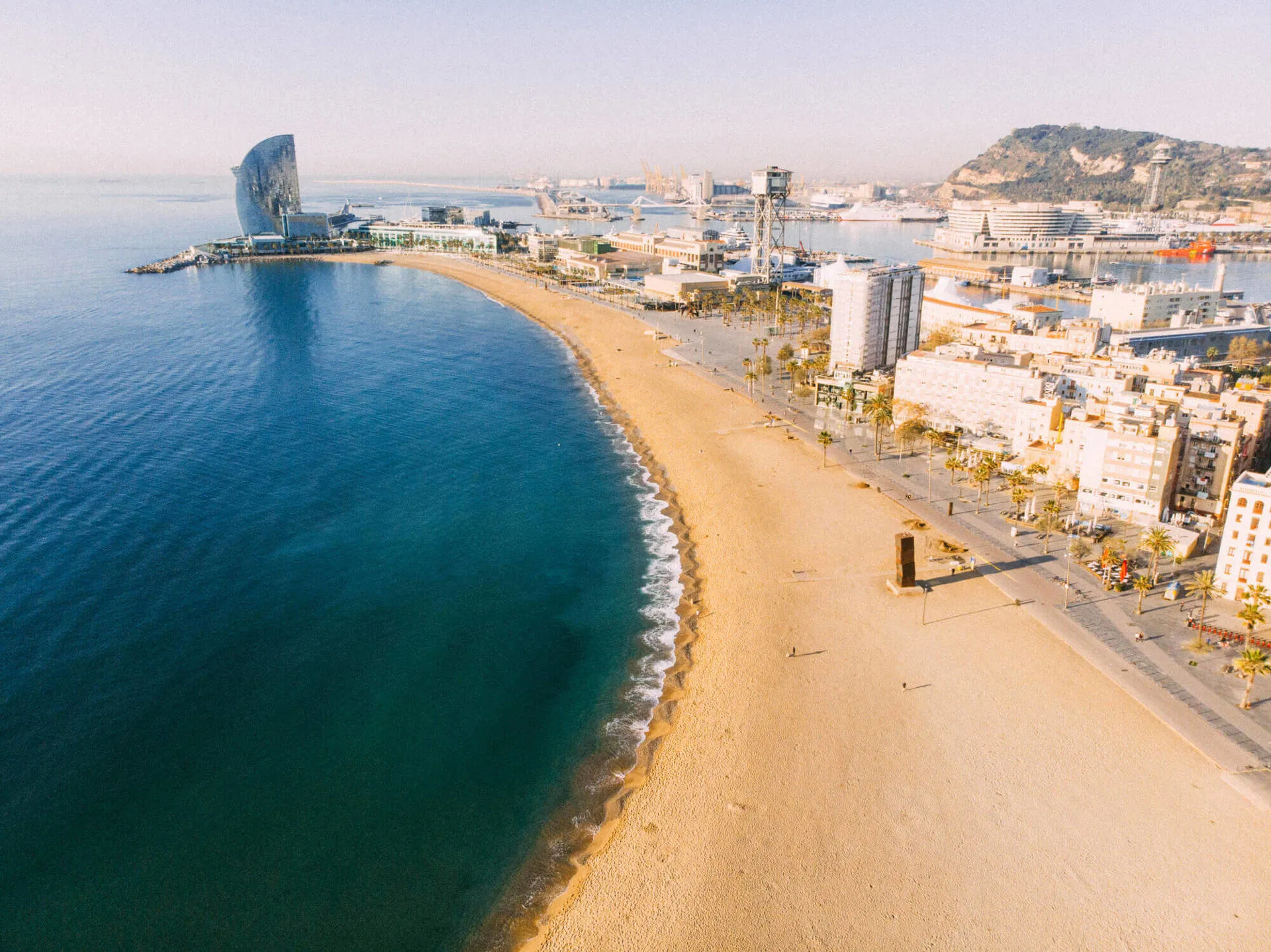 An empty beach coastline in Barcelona, Spain.