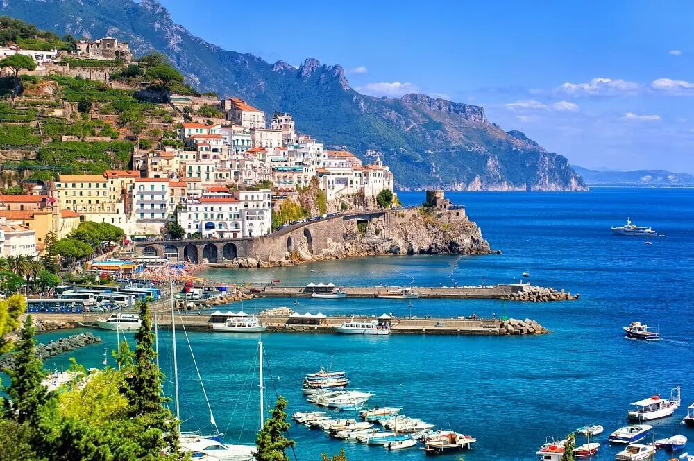 A view of buildings and the ocean on the Amalfi Coast.