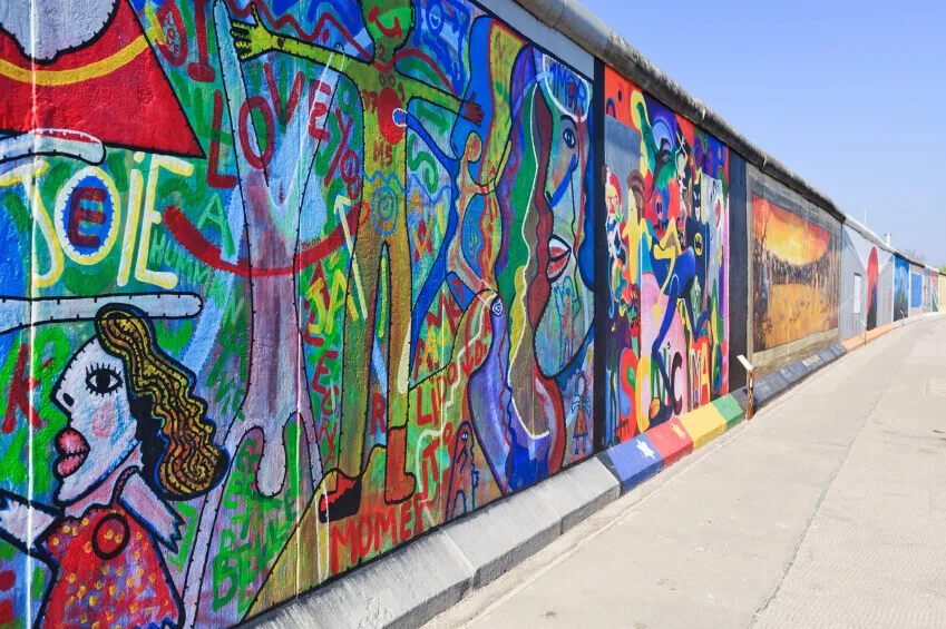The East side of the Berlin Wall, decorated with street art and graffiti.